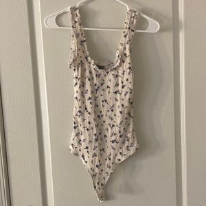 Creme Colored Women’s Floral Bodysuit